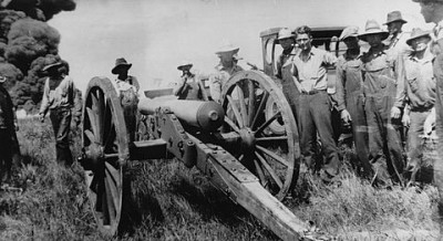 Cannon fires at burning oil tanks from the collection of the Kansas Oil Museum.