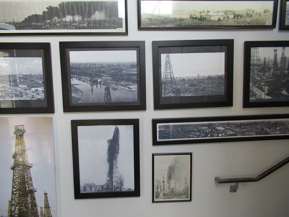Historic Oklahoma oilfield photos are on display in the Mid-Continent Geological Library.