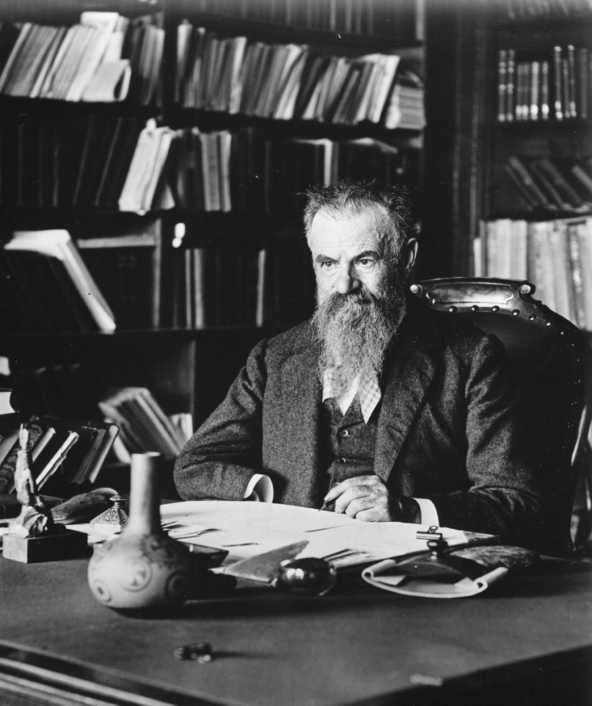 petroleum history march John Wesley Powell at his desk