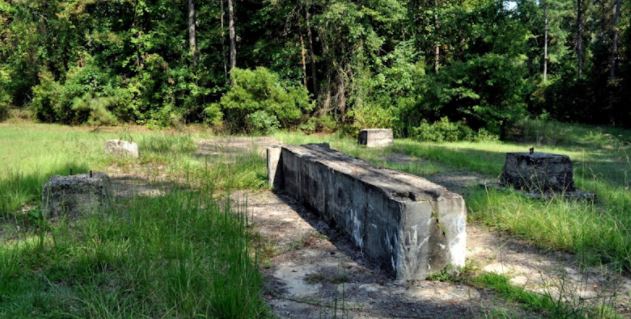 Concrete foundation of Alabama's first oil well, the A.R. Jackson Well No. 1.
